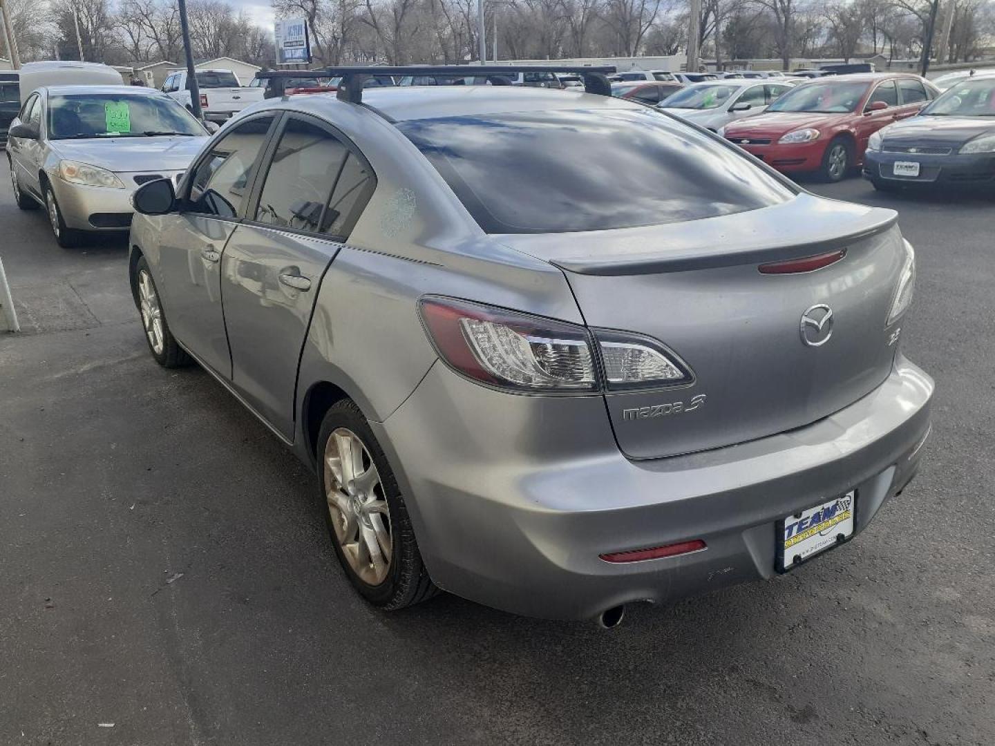 2012 Mazda MAZDA3 s Grand Touring 4-Door (JM1BL1W64C1) with an 2.5L L4 DOHC 16V engine, located at 2015 Cambell Street, Rapid City, SD, 57701, (605) 342-8326, 44.066433, -103.191772 - CARFAX AVAILABLE - Photo#3